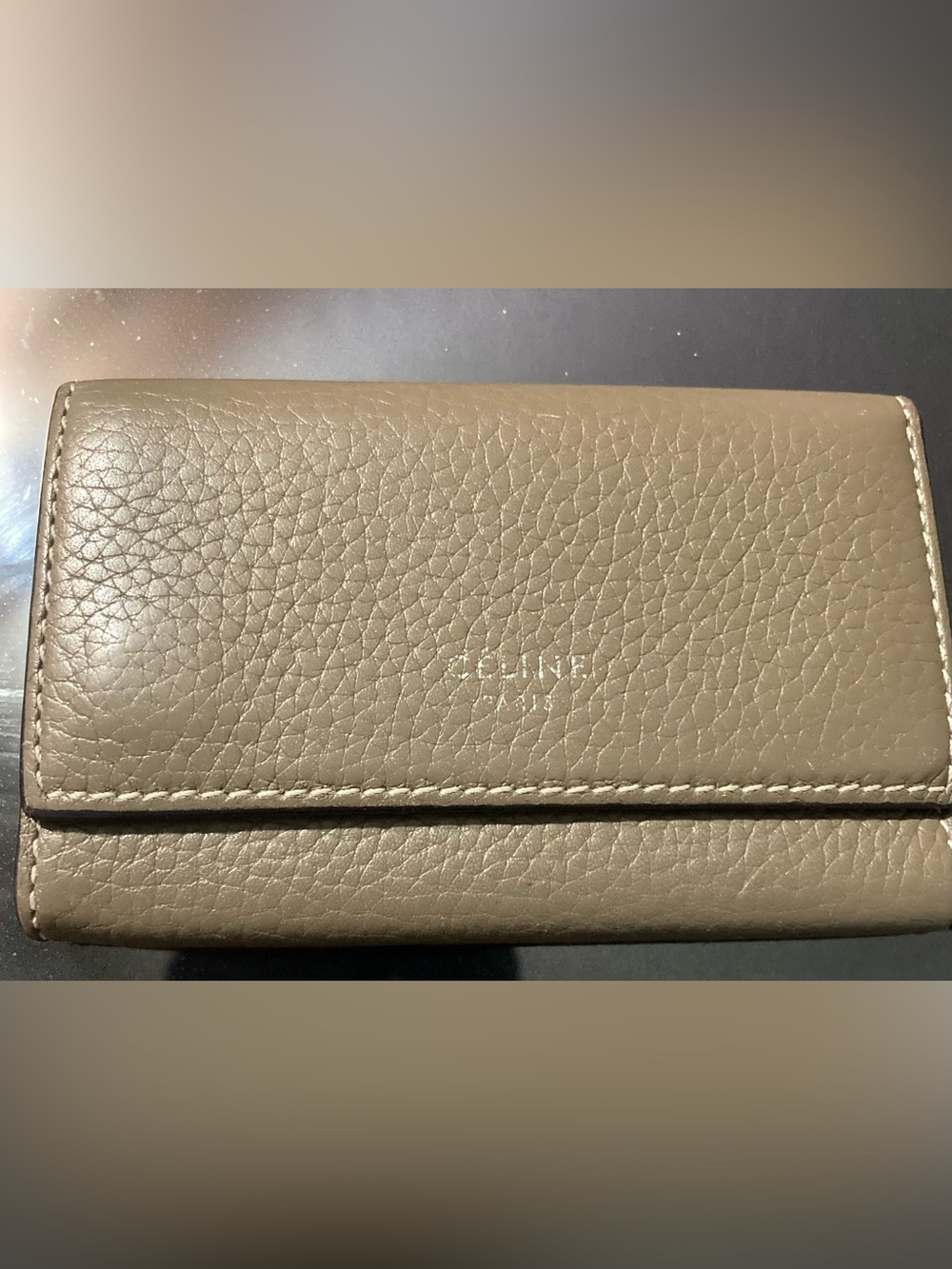 Celine Compact Trifold 6 Ring Key Case/Wallet crafted from grained calfskin.